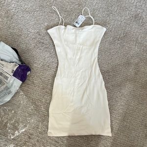 Brand new never worn size small white/cream rubbed stretchy dress